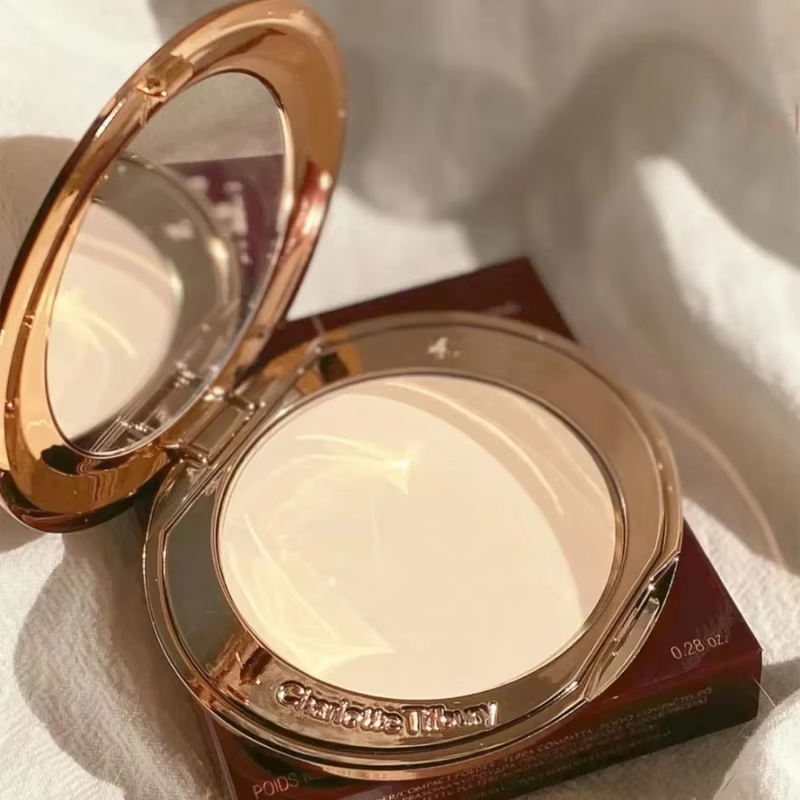 Charlotte Tilbury Contour Wand - огляд і ціна Makeup Fixing Mist